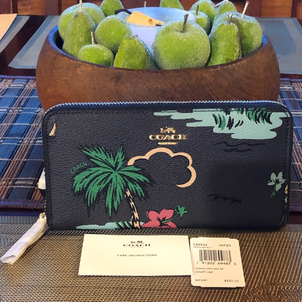 Coach accordion zipper wallet.